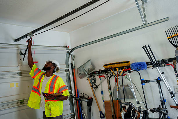 Professional Garage Door Panel Replacement technician working in Morrisville, NY